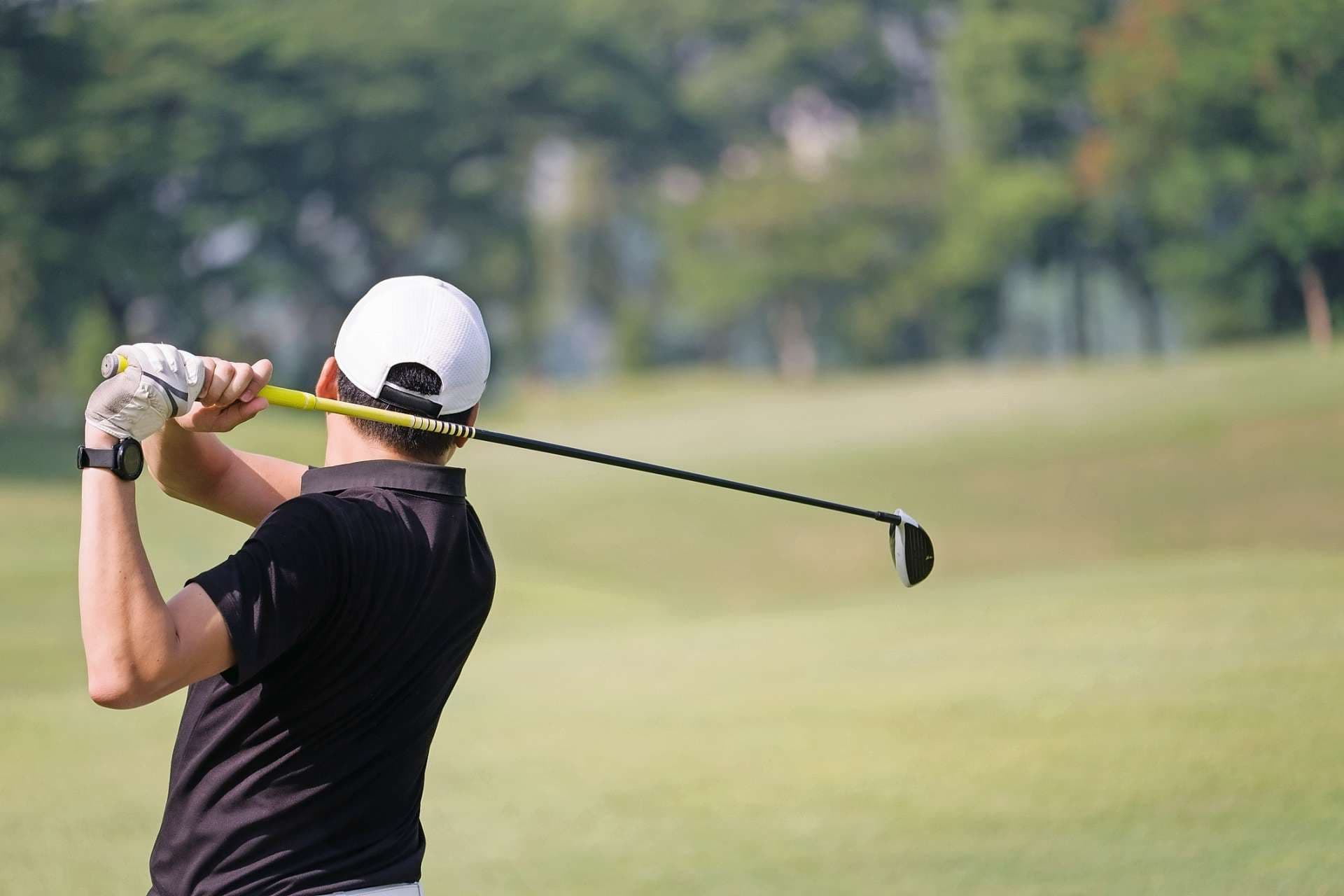 golf shot from the fairway towards the putting green