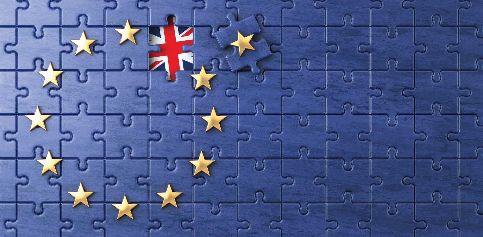 Die EU-Falgge als Puzzle. Der Puzzlestein eines der Sterne liegt daneben und gibt den Blick auf den Union Jack frei.