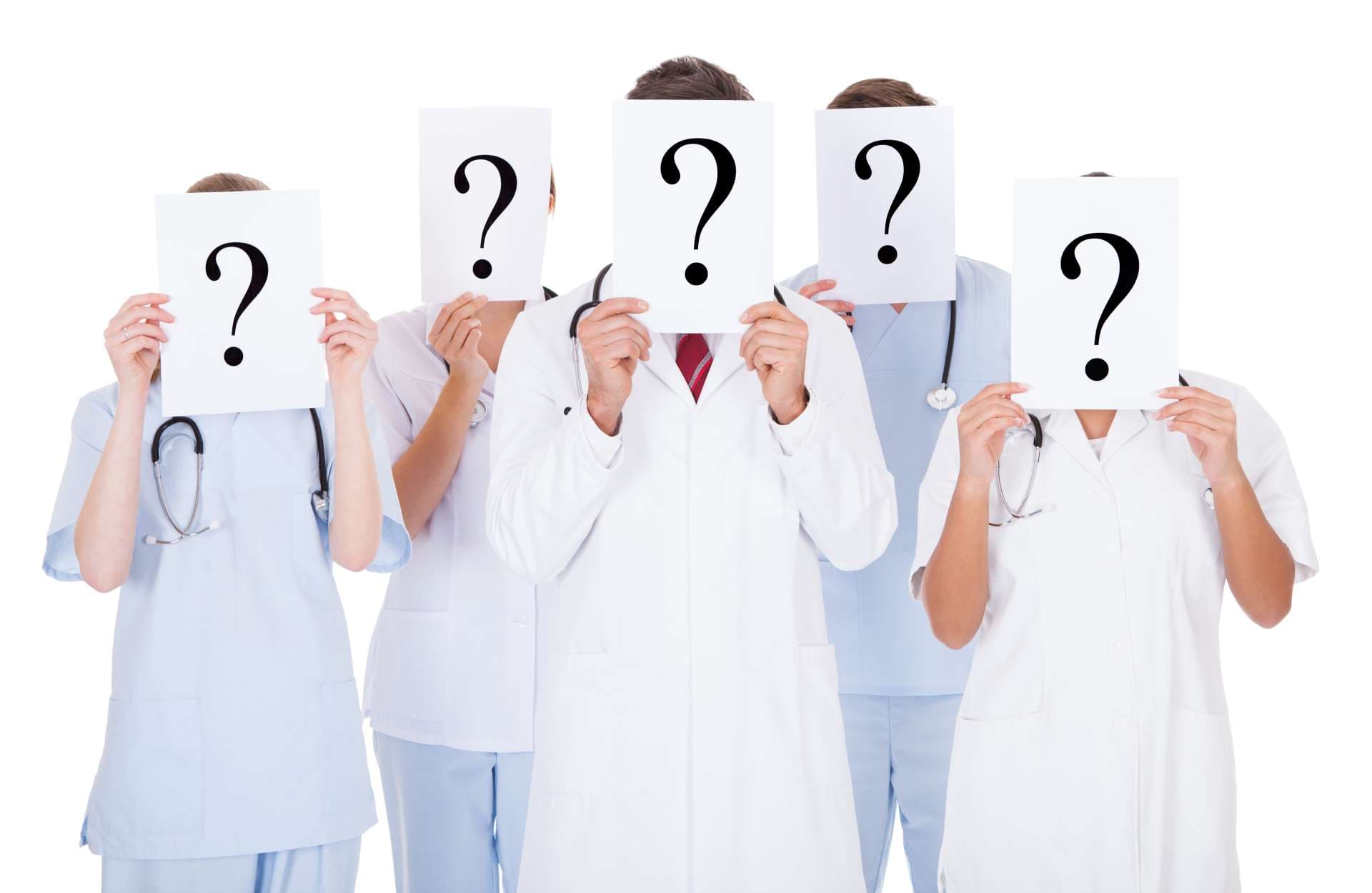 Group Of Doctors With Question Mark Sign