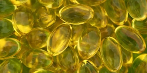A very close view of vitamin a gel capsules.