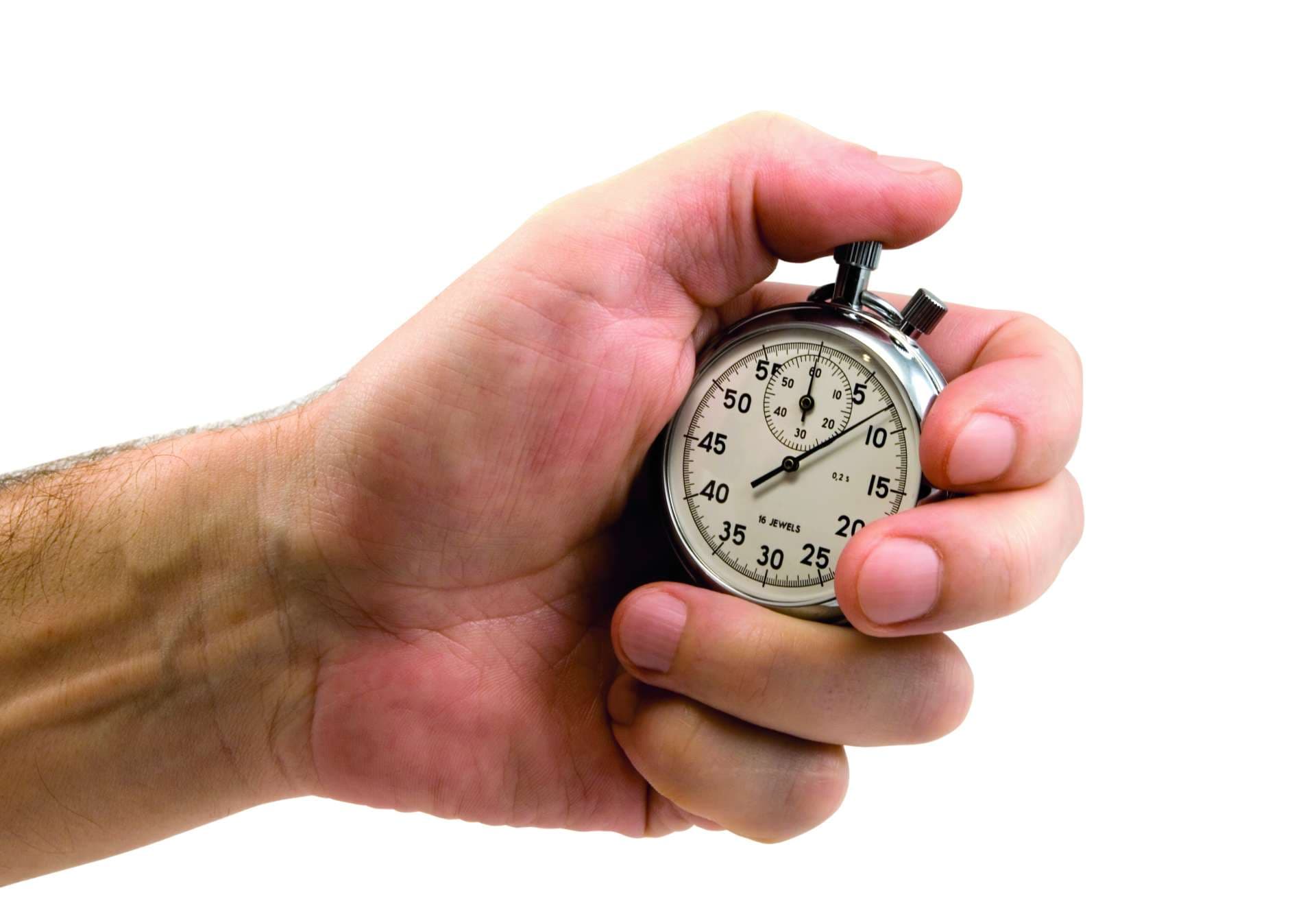 Stop-watch in a hand, isolated on white, clipping path included