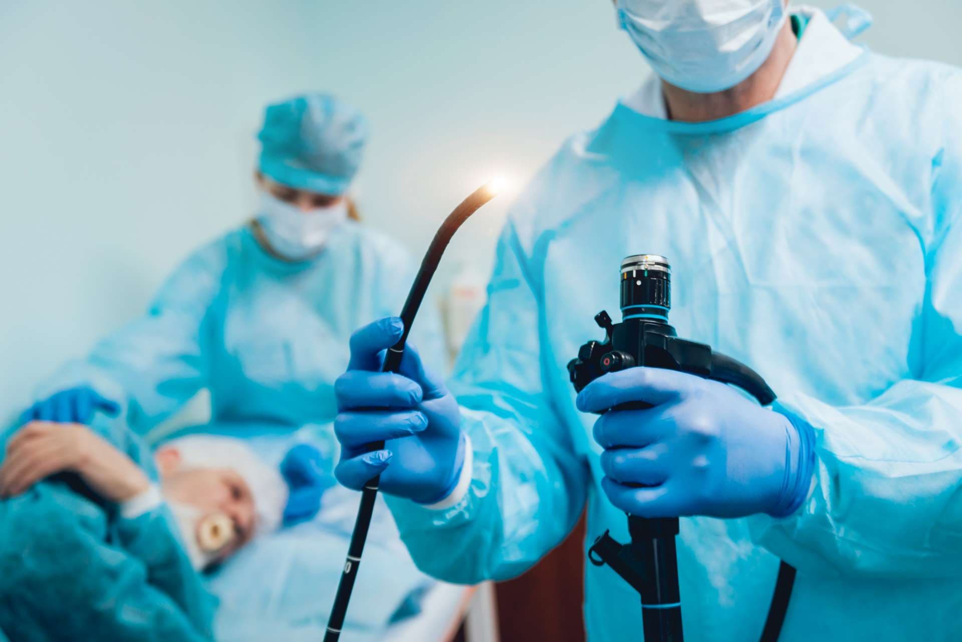 Endoscopy at the hospital. Doctor holding endoscope before gastroscopy. Medical examination