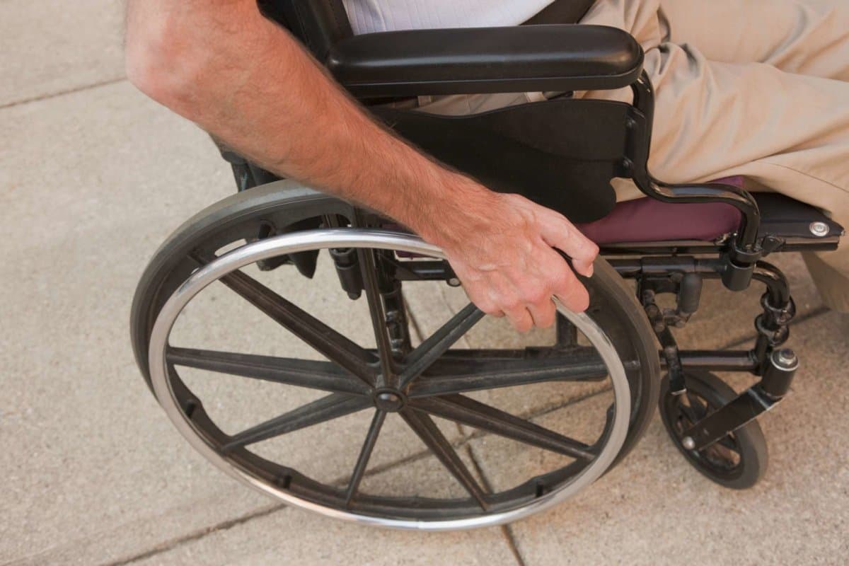 Man with a Friedreich&#8217;s Ataxia sitting in a wheelchair