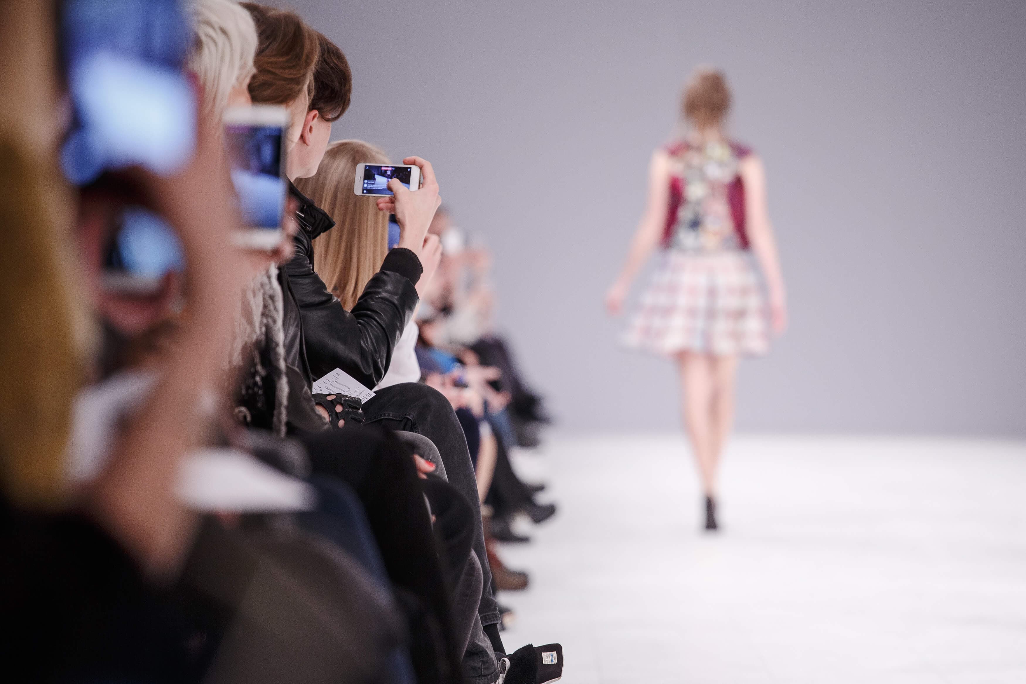 People making photos during the fashion show
