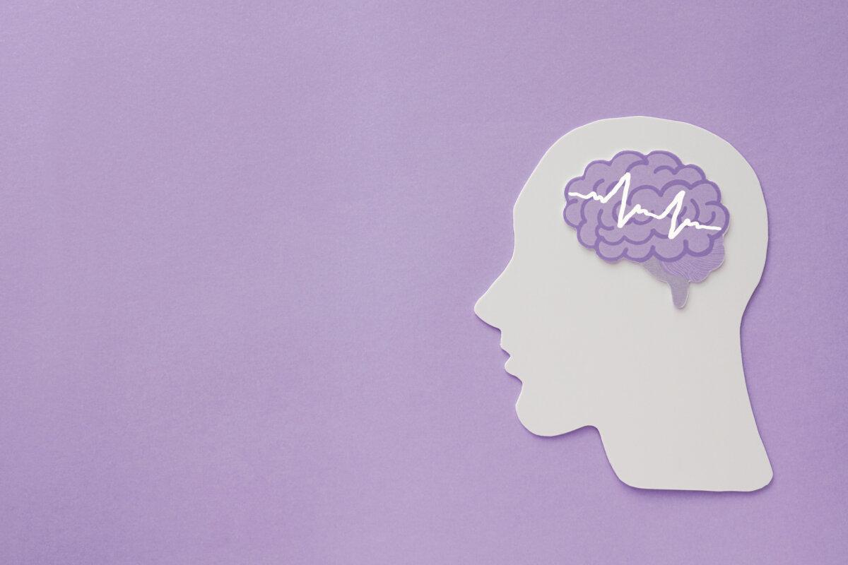 Enzephalographie Gehirn Papier Ausschnitt auf lila Hintergrund, Epileps