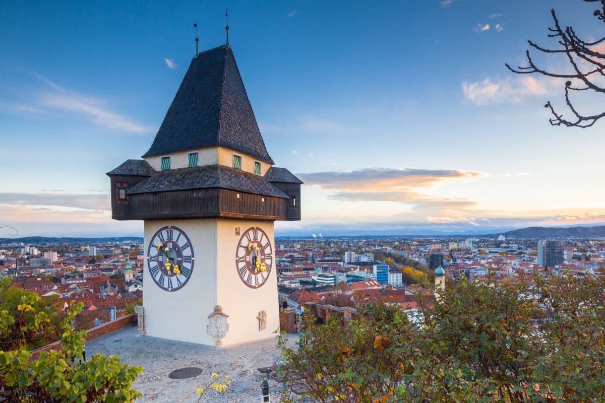 Graz clock tower at sunset, Graz, Styria, Austria