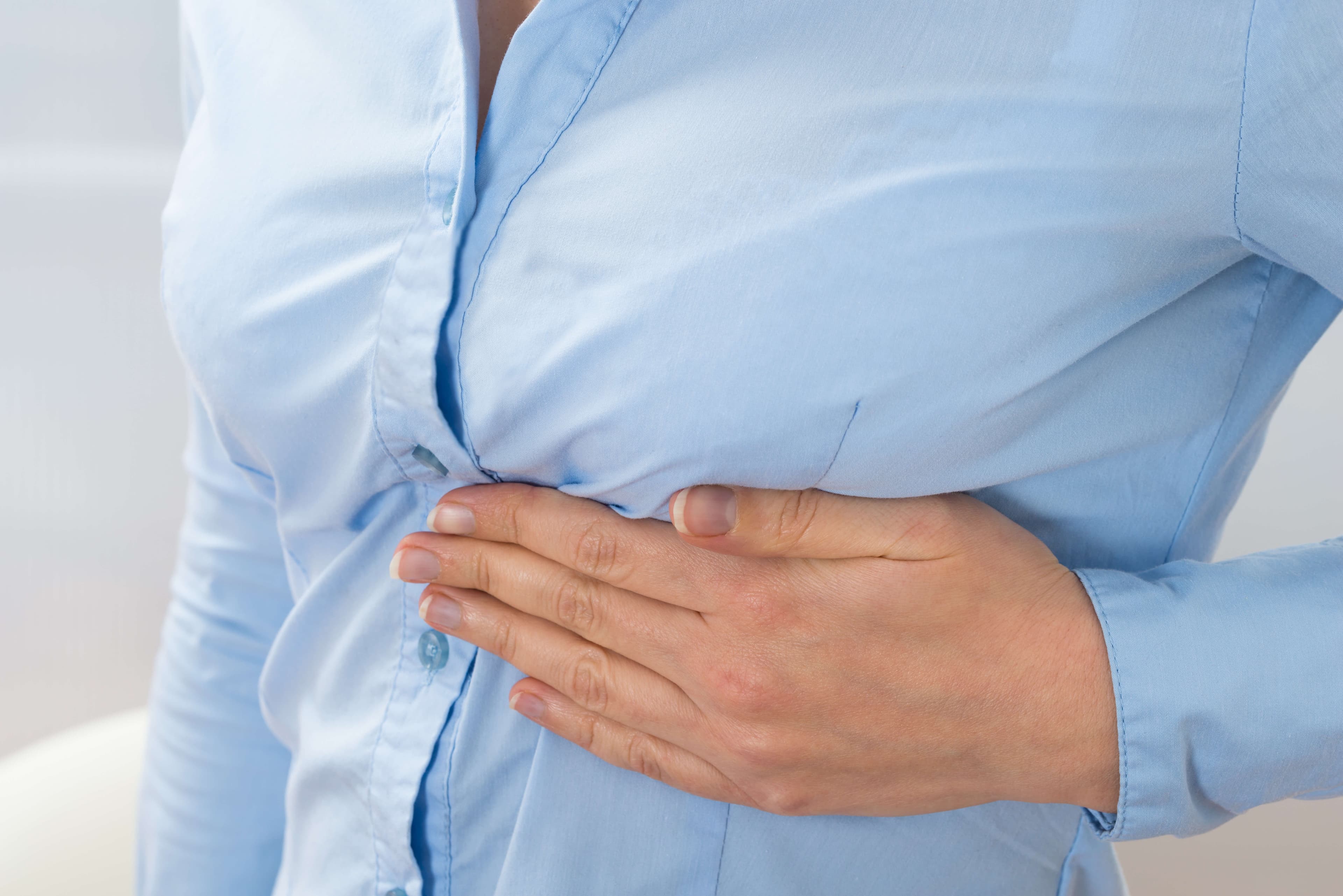 Close-up Photo Of Businesswoman Suffering From Pain