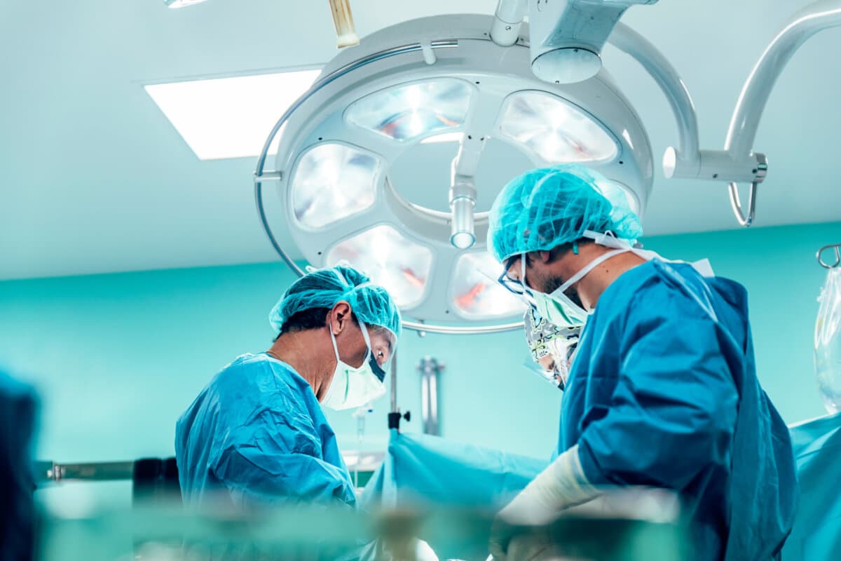 Team of Surgeons Operating.