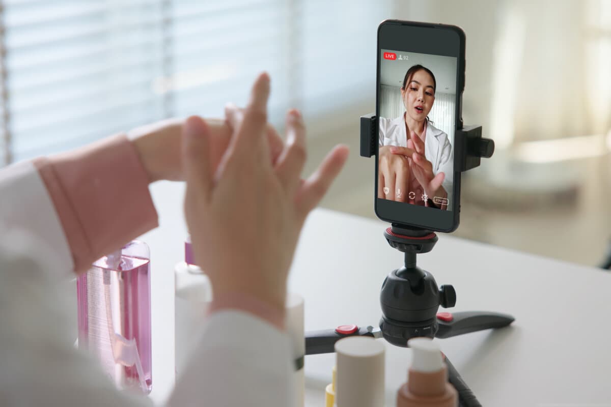 Asia woman people anti aging expert modern health vlogger live advice talk selfie video mobile phone camera.