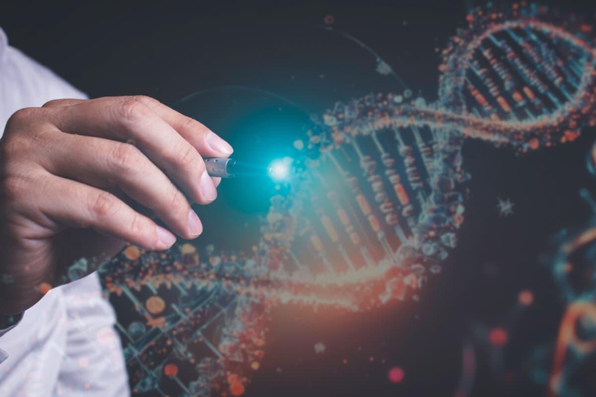 Finger touching DNA, genetically modified DNA, black background concept in invention. Developing genetically modified human genes