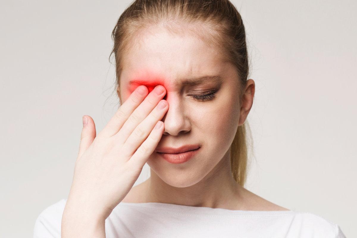 Upset woman suffering from strong eye pain. Healthcare concept, panorama