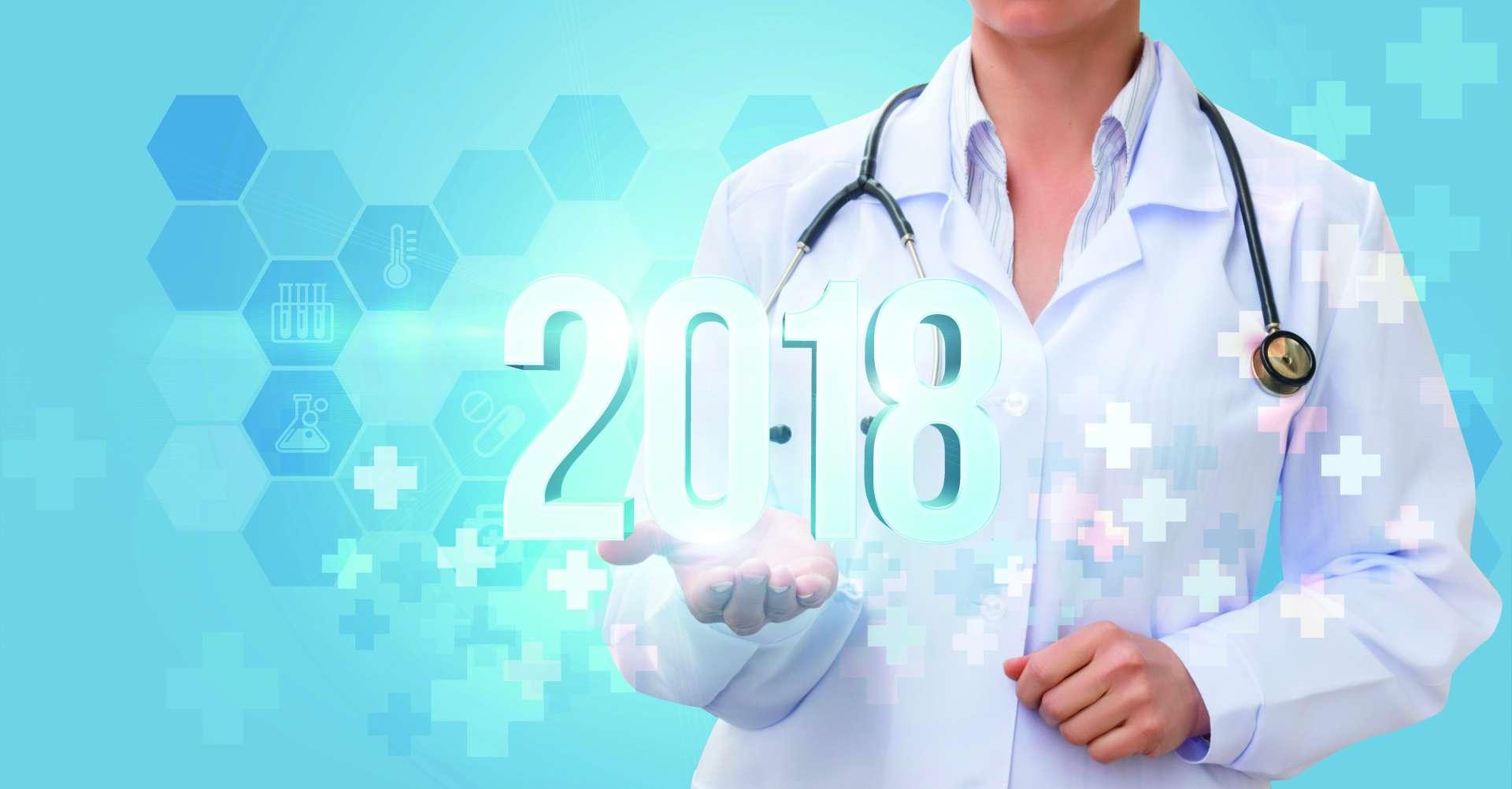 Arzt zeigt die Zahlen 2018. Banner das neue Jahr.