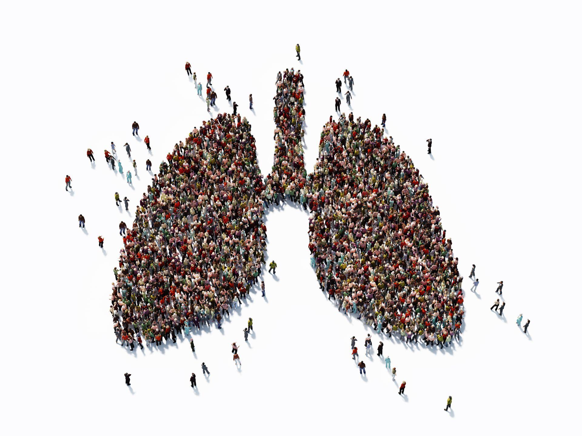 Menschliche Menge, die ein großes Lungensymbol bildet