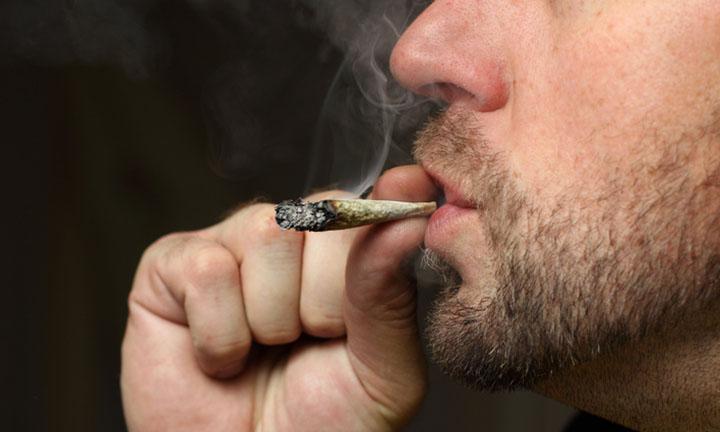 A shot of a man smoking pot.Please visit my Marijuana lightbox./file_thumbview_approve.phpsize=1&amp;id=11835431