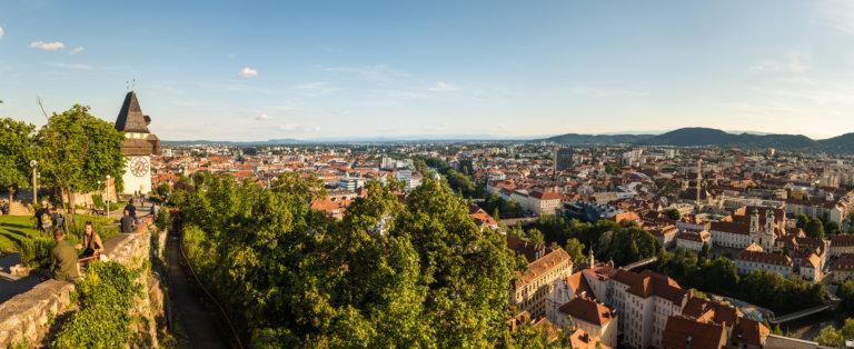 Graz, Austria - 13.07.2020: Panorama view from the top of schlossberg hill over the city