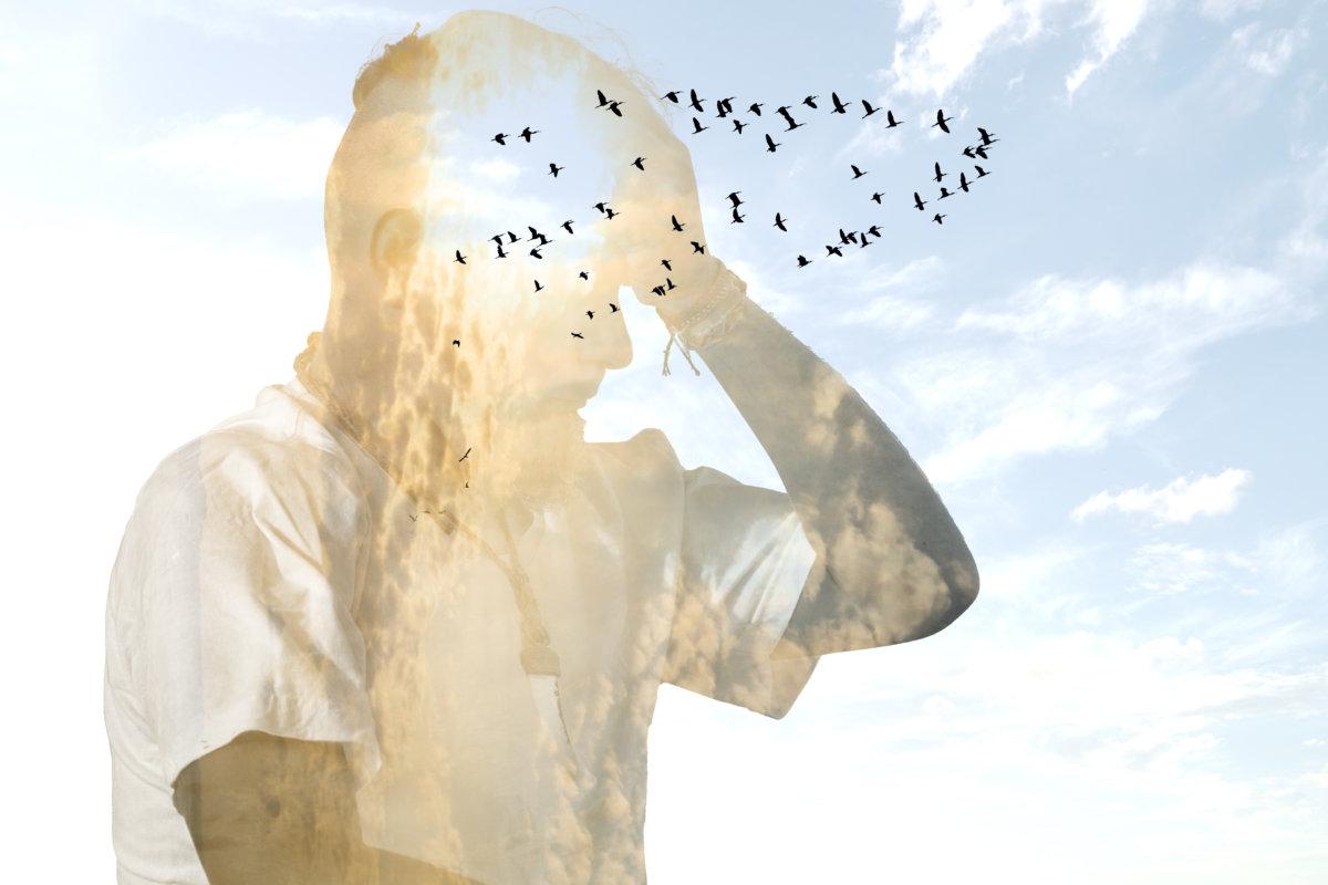 Man with free thoughts. Mental health concept. Multiple exposure photography.