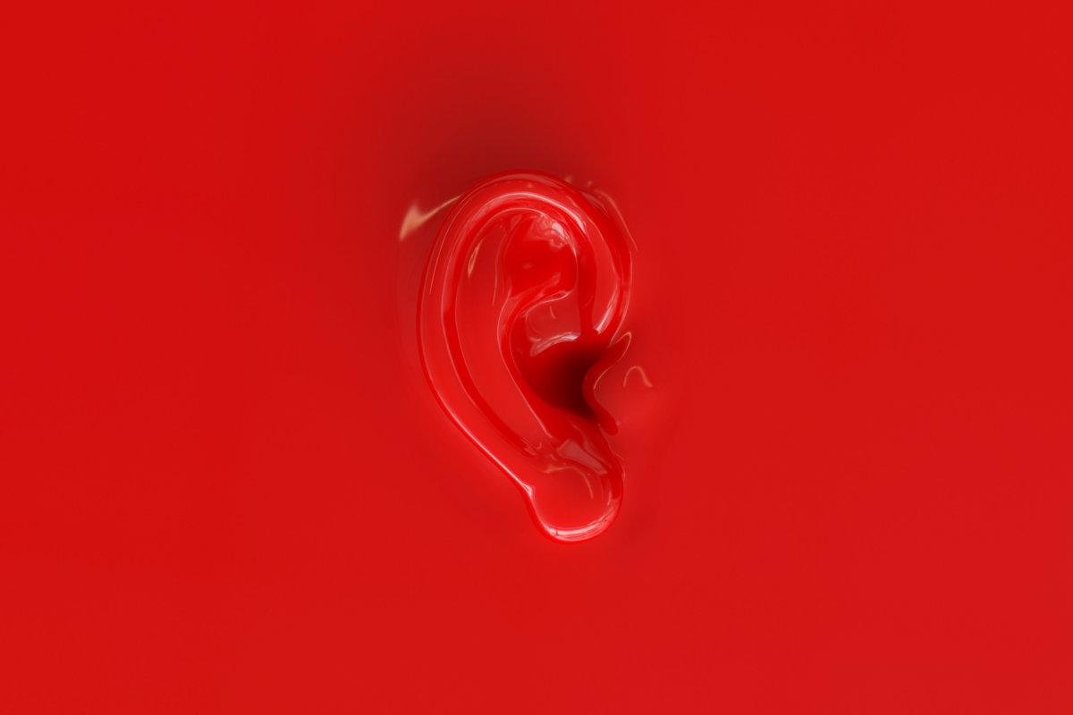 An ear as background in red lacquer look -- 3D Rendering